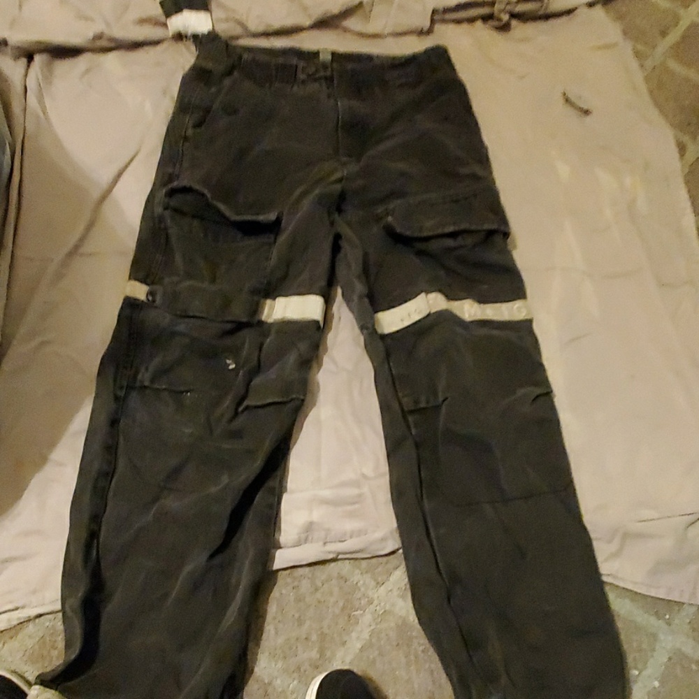 Black and grey Girbaud jeans